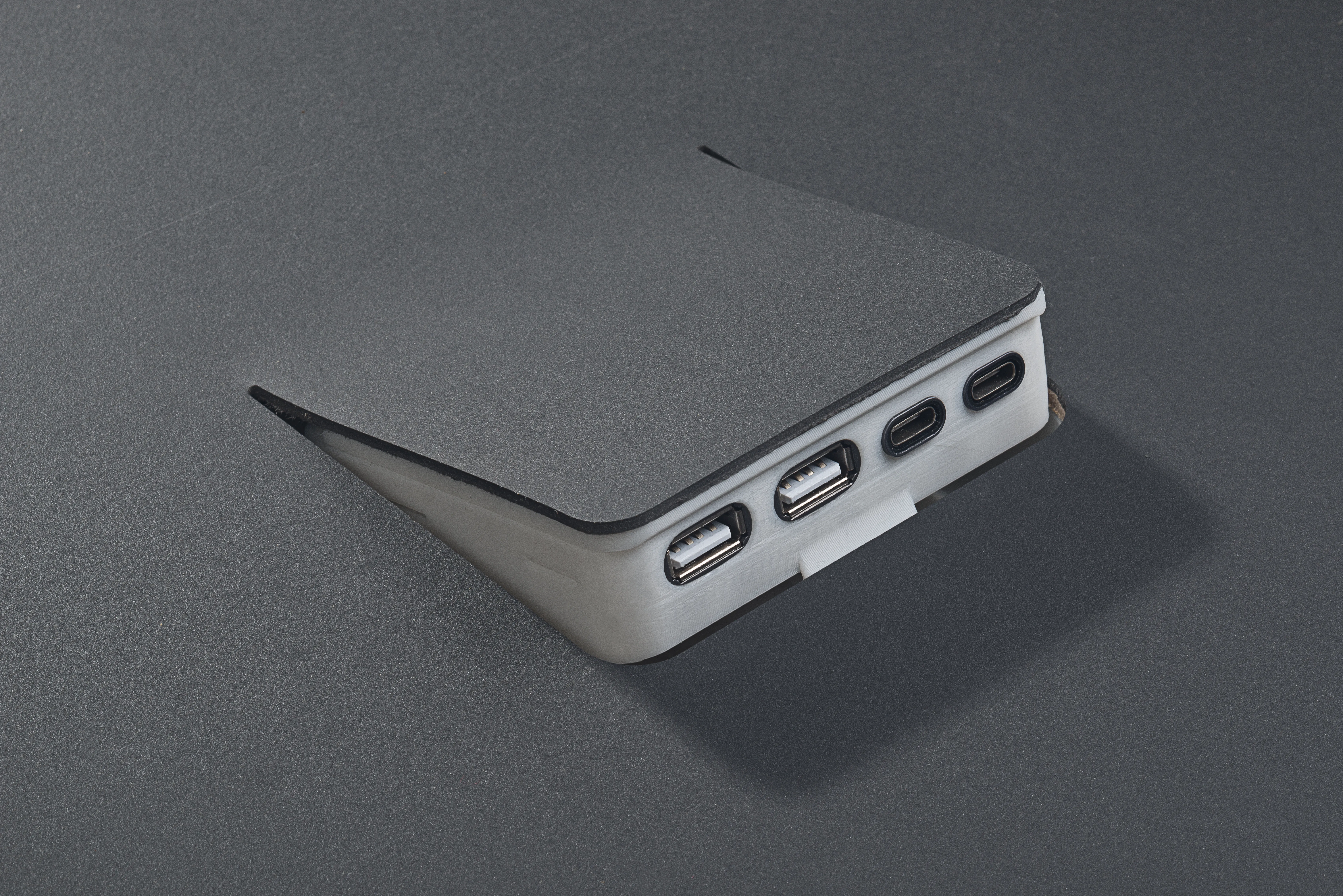 Flush mounted, retractable USB hub that disappears when not in use.